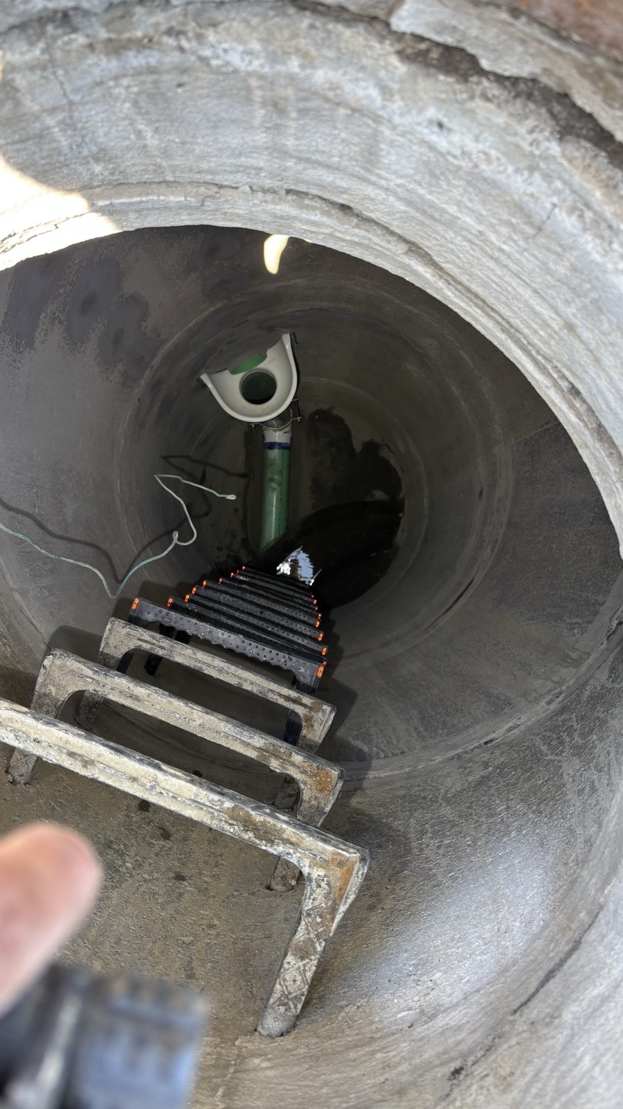 Concrete shaft with ladder access